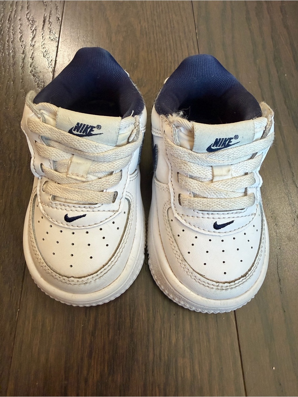 Nike Kids White Sneakers with Navy Accents